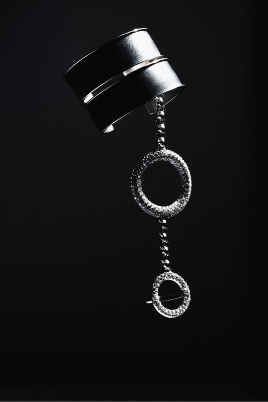 Zylberstein French fashion luxury statement bold jewelry silver palladium metal leather cuff with detachable chain and adjustable circle ring with Swarovski crystals rings