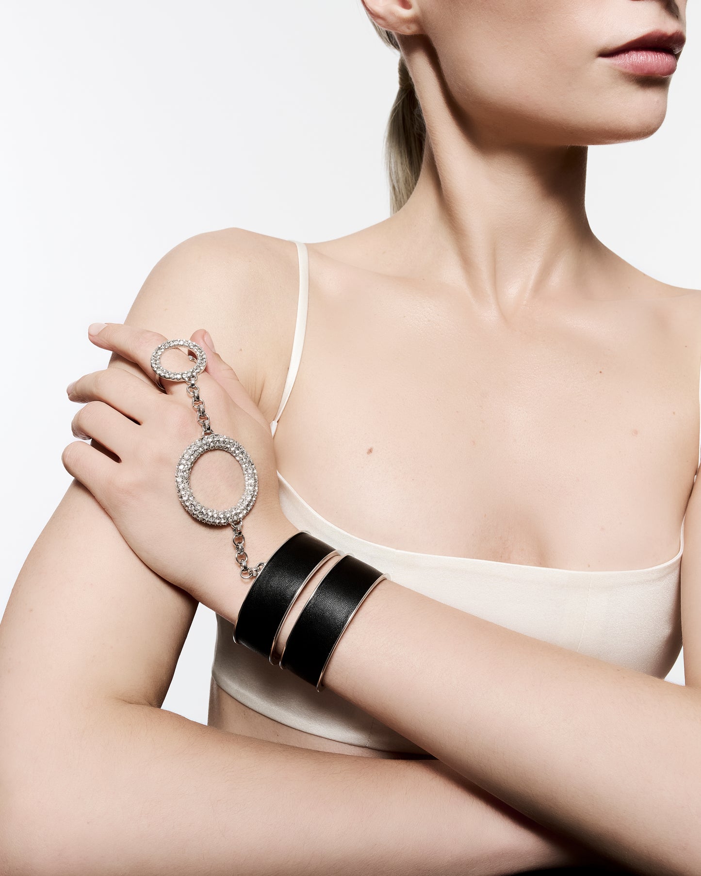 Zylberstein French fashion luxury statement bold jewelry silver palladium metal leather cuff with detachable chain and adjustable circle ring with Swarovski crystals rings