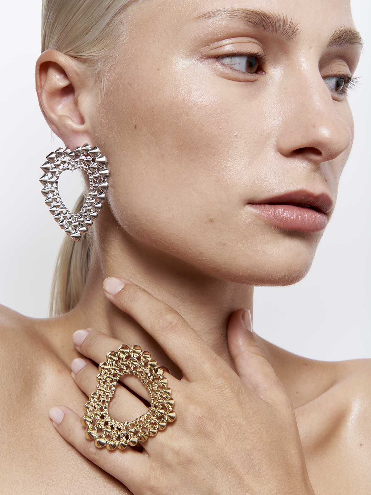 French designer punk rock couture fashion luxury silver trendy sustainable statement spike studded heart earrings