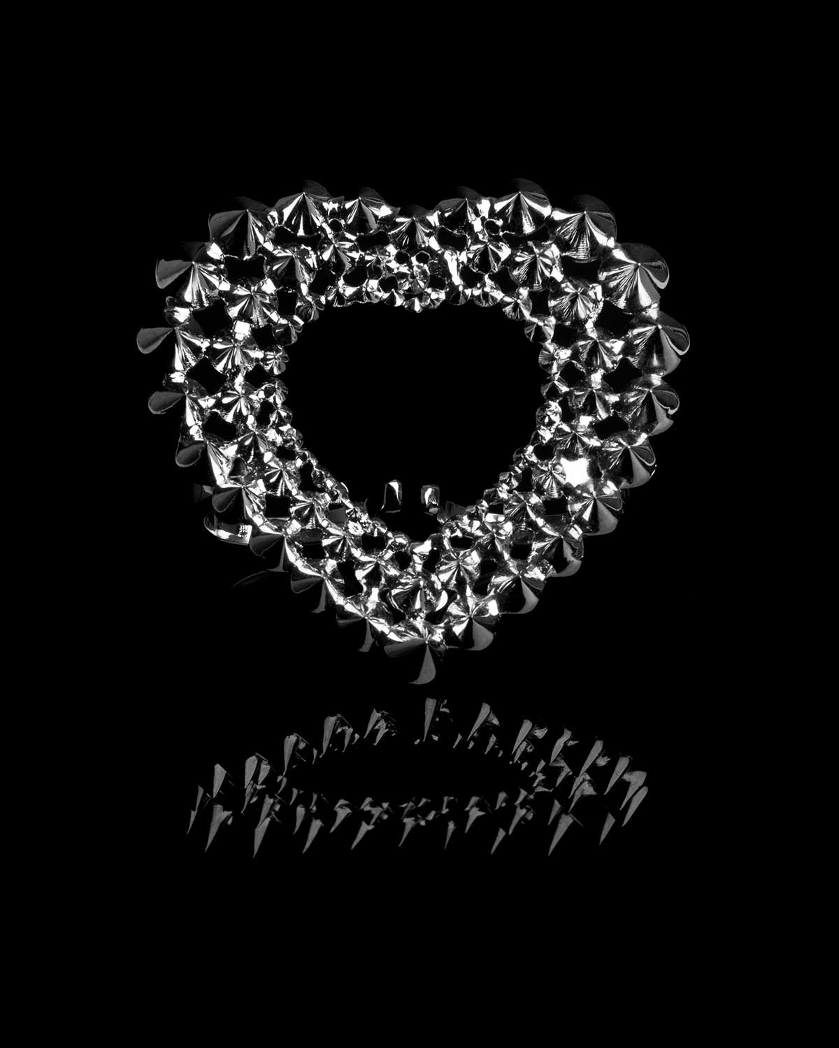 French designer punk rock couture fashion luxury silver trendy sustainable statement spike studded heart double ring