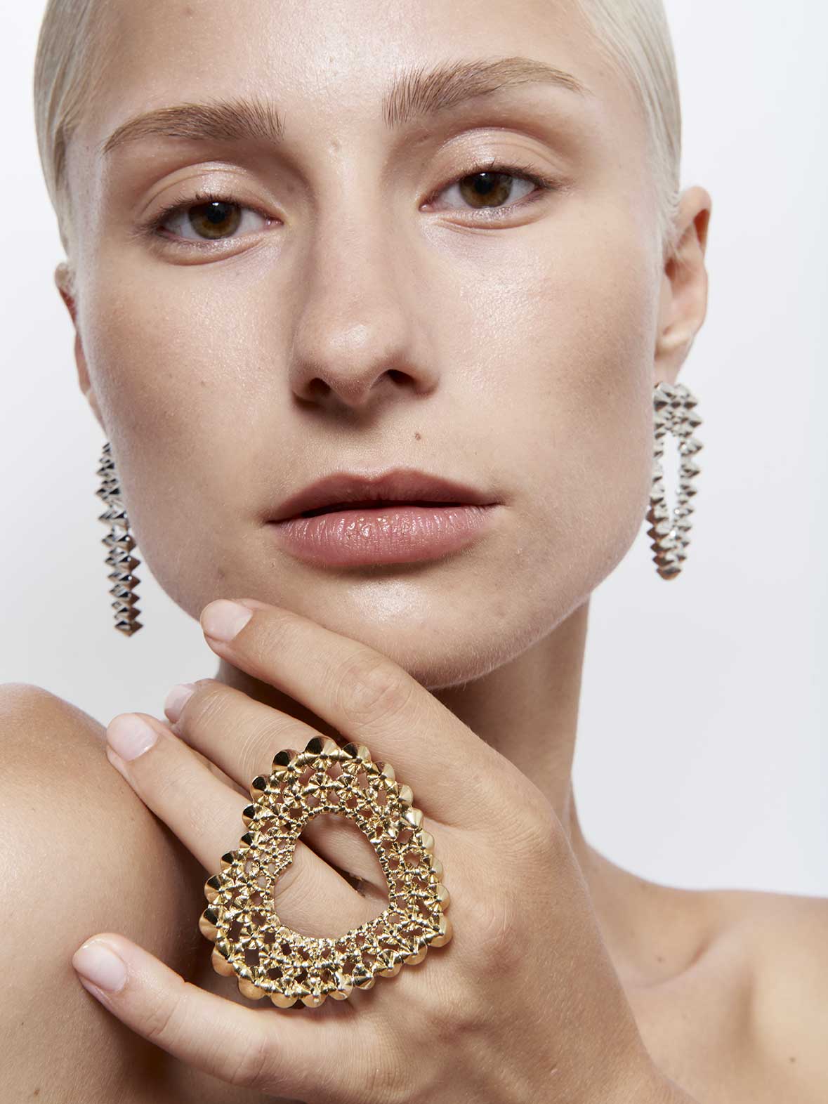 French designer punk rock couture fashion luxury gold trendy sustainable statement spike studded heart double ring