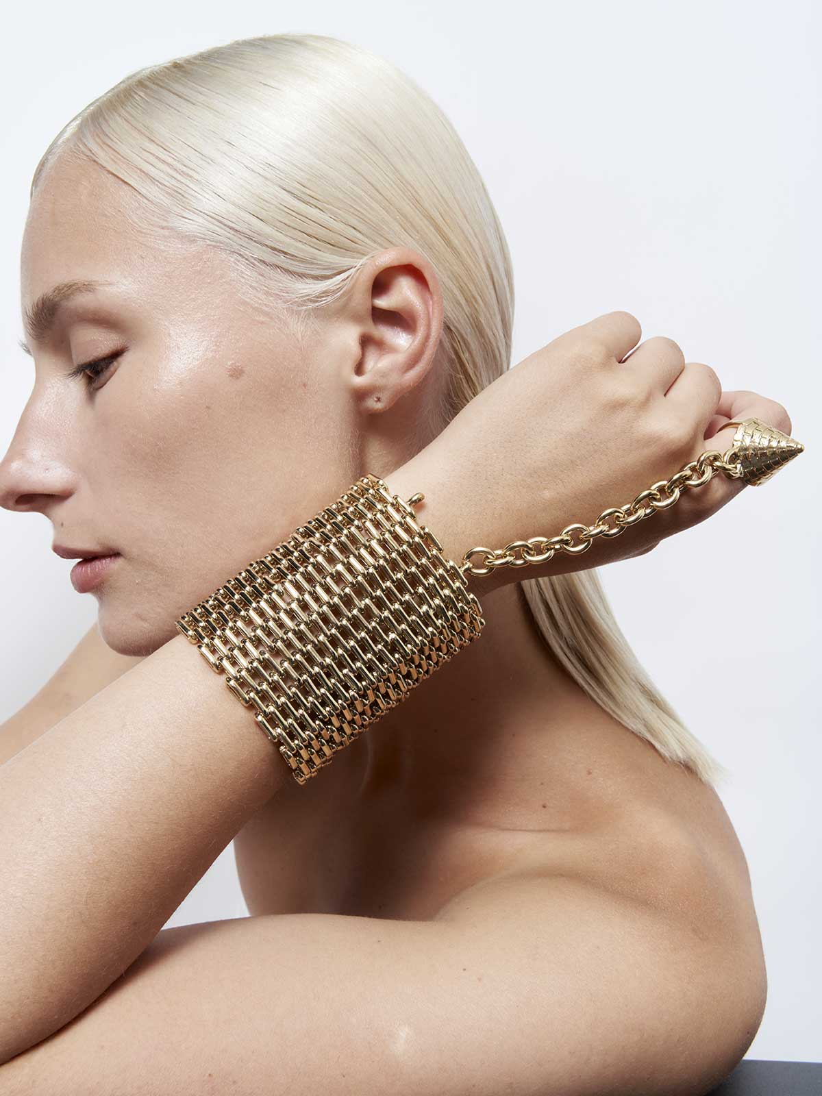 Fashion jewelry french designer punk rock couture sustainable gold removable studded spike ring chain statement style cuff bracelet