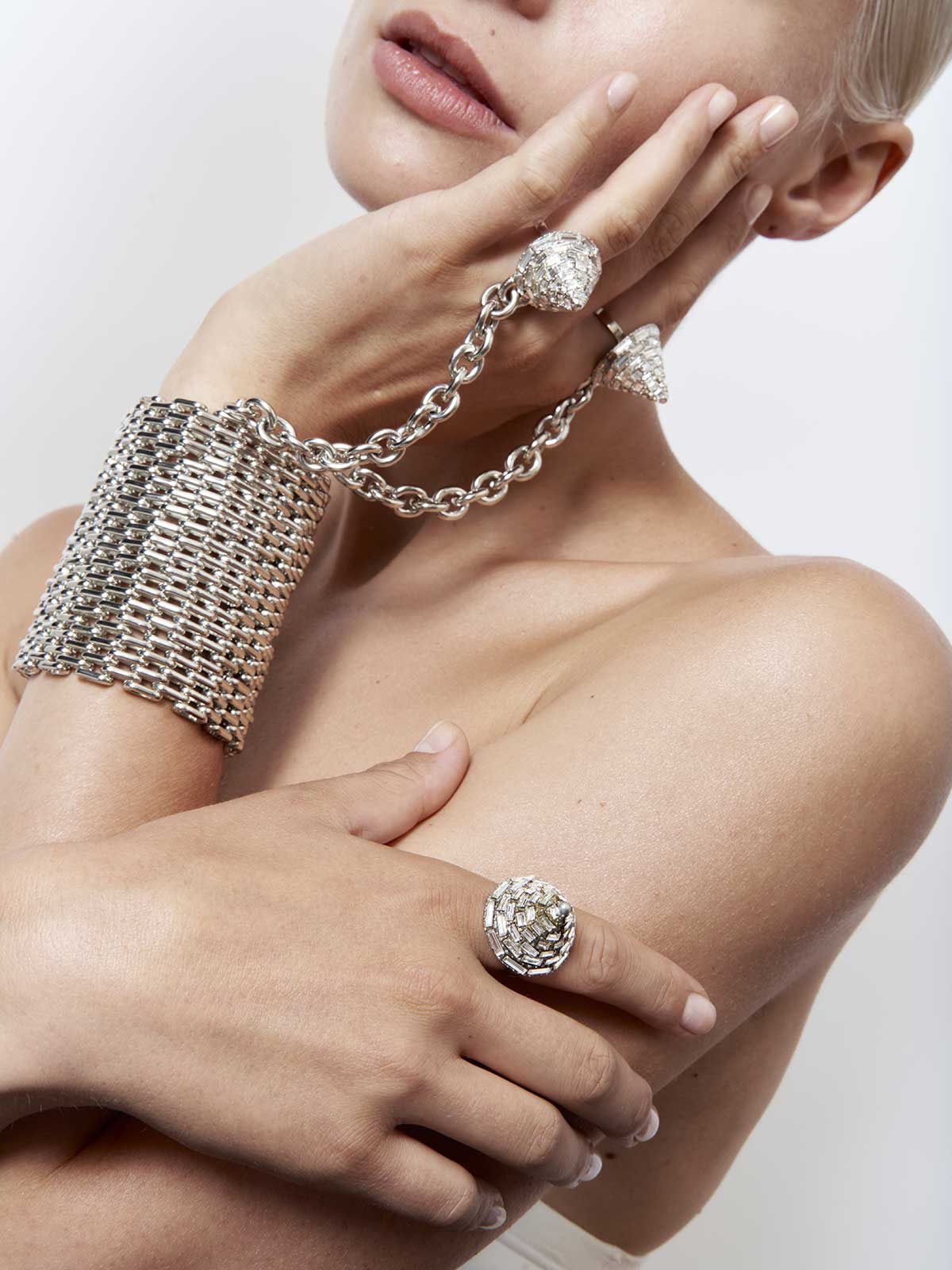 Fashion jewelry french designer punk rock couture sustainable silver Swarovski crystals removable studded spike ring chain statement style cuff bracelet