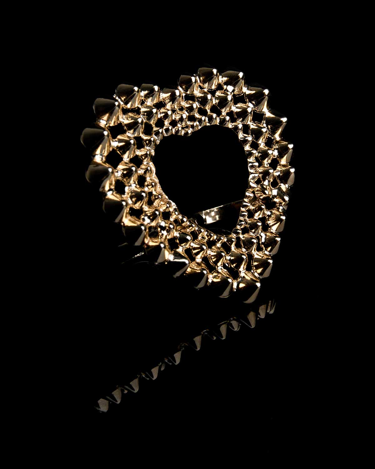 French designer punk rock couture fashion luxury gold trendy sustainable statement spike studded heart double ring  